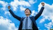 © 99 RIC - a man raising both hands as a sign of victory or celebration