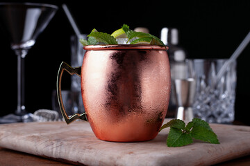 Moscow mule with bar equipment background.