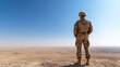 © Катерина Євтехова - A soldier in desert camouflage, standing guard at an outpost under the scorching sun, with a distant view of the barren landscape stretching out behind them.