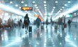 © Alina - Blurred people in motion in airport terminal