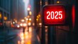 © Halina Berah - At night, a neon sign showing the year 2025 hangs in a city