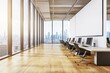 © Антон Сальников - A modern open space office with windows overlooking the city, empty workstations, blue chairs, white walls, and wooden floor, with light. 3D rendering.