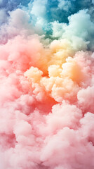 Wall Mural - a colorful cloud of smoke with a rainbow effect. the smoke is pink, yellow, and blue