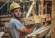 © yachyah - Construction Worker Carrying Lumber
