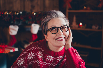 Sticker - Photo of dreamy thoughtful woman wear red print xmas sweater glasses enjoying christmas arm cheek indoors apartment room