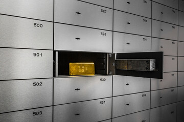 Bar of gold in a safe.