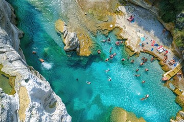 Wall Mural - Group of people swimming in a river on a sunny day