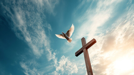 A white dove flies over a cross in the sky