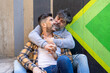© ADDICTIVE STOCK - Gay couple enjoying a relaxed moment together outdoors