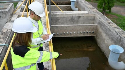 Wall Mural - Environmental engineers work at wastewater treatment plants,Water supply engineering working at Water recycling plant for reuse