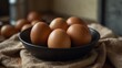 © Den Boro Day - Fresh and healthy brown eggs in a frying pan on a kitchen table Start your day with a nutritious egg for a healthy breakfast.