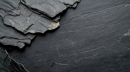 Canvas Print -   A close-up image of a black slate surface reveals a crack running through its center