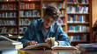 © Lumos Studio - Teenage Boy Studying in a Library