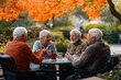© kenkuza - A group of senior citizens are sitting and chatting happily in a park