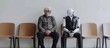 © MD Media - AI robot sitting on a chair next to an elderly man with coffee, both waiting for a job interview. AI vs human concept. futuristic technology coexisting with people in a professional environment