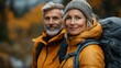 © Thoa - active beautiful couple hiking together in autumn mountains portrait of senior.stock image