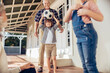 © Marko Geber - Grandparents and grandchildren having fun on home porch with football