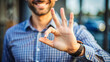 © Konstantin - Closeup of male hand showing ok sign gesture