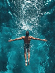 Athlete Diving into Clear Blue Water