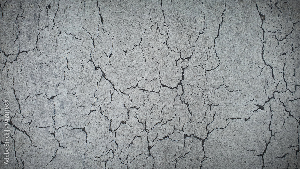 High-resolution cracked earth texture featuring natural gray tones ...