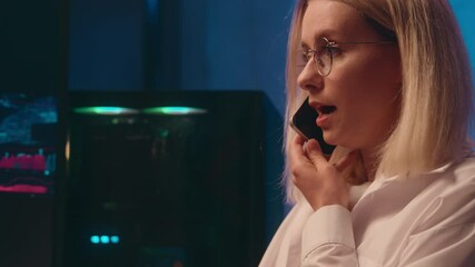 Caucasian stressed girl multitask businesswoman night home office female trader broker annoyed business woman argue quarrel talk mobile phone discuss stock market crypto trading computer e-commerce