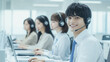 © bephoto - コールセンターで働く日本人オフィスワーカー