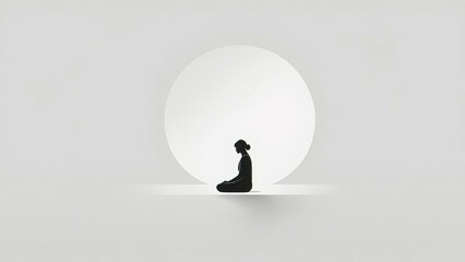 Canvas Print - black and white photo of a person sitting on the floor