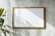 © lunarts_studio - Blank picture frame mockup on wall. Light room minimal design. View of modern scandinavian style interior with artwork mock up on wall. Home staging and minimalism concept