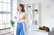 © Pixel-Shot - Female nutritionist with glass of juice in office