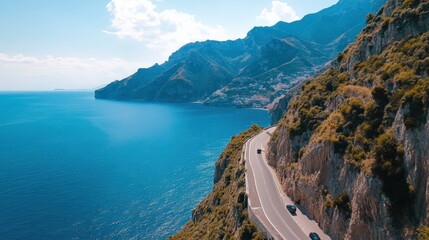 The coastal cliffs and winding roads of the Amalfi Coast, Italy, bathed in day light