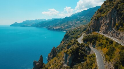 The coastal cliffs and winding roads of the Amalfi Coast, Italy, bathed in day light