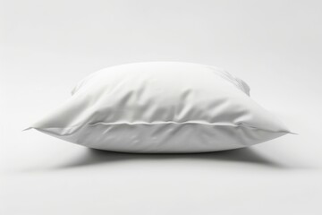 Poster - A single white pillow resting on a clean white floor, perfect for minimalist interior design or product photography