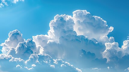 Wall Mural - Cumulus clouds against a blue sky