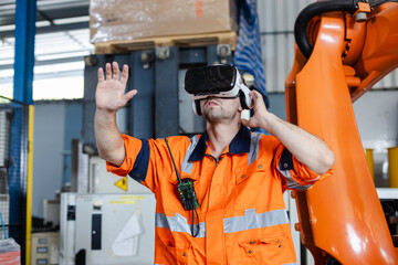 Industrial robotics engineer man using virtual reality glasses. goggles innovation future watching education internet. Work is controlled through modern digital system.