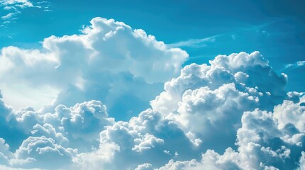 Puffy cumulus clouds on blue sky for backgrounds