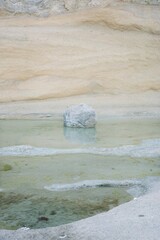 Abstract big rock in the water