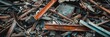 © 2rogan - Close-up of a disordered collection of scrap metal, broken wooden boards, and plastic waste at a demolition location, representing waste management, recycling, and a junkyard.