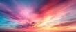 © nattapon98 - Ethereal Twilight Sky, vibrant hues of pink and blue blend seamlessly in a dramatic display, capturing the breathtaking beauty of a serene sunset.