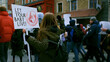 © sibway - Anti murder demonstration city street Stop abortion protest. Girl hold let baby live placard. Kill ban prohibition. Pro life banner. No roe v wade law. Angry women crowd. Lot female people fight right