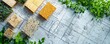 © ImagePulse - Eco-friendly building materials arranged on a blueprint, with greenery intertwined, highlighting sustainable construction practices