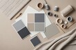 © ThomasLENNE - Stylish  flat lay composition in beige and gray color palette with textile and paint samples, panels and tiles