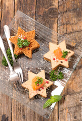 Canvas Print - gourmet gingerbread star shape canape with foie gras and salmon