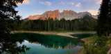 Fototapeta Góry - steel blue lake in the mountains with sunset