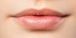 © auc - close-up of soft pink lips with natural makeup, smooth and youthful skin texture, beauty and cosmetic concept, feminine and attractive mouth.