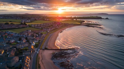 Golden hues dance over a seaside town as the sunset weaves a tapestry of tranquility and beauty.