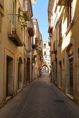 Sticker - A street between old houses of Isernia, a city in Molise,  Italy.