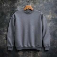 grey color blank sweatshirt mock up. A minimalist gray sweatshirt is elegantly displayed on a wooden hanger against a textured dark background, perfec