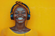 © syhin_stas - Joyful young woman listening to music in headphones on white background.