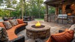 © Raitalinn - A cozy outdoor living space, complete with a fire pit, patio furniture, and a grill, invites warmth and comfort.