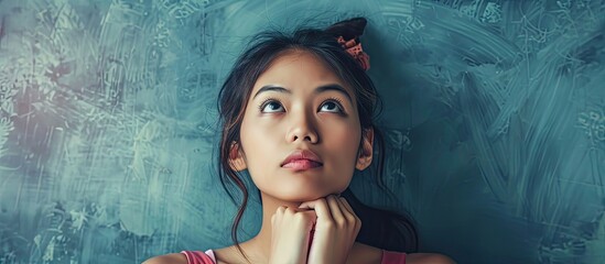 Canvas Print - An Asian woman appears uncertain pondering various choices with a mix of doubt and confusion contemplating which decision to pursue in a copy space image